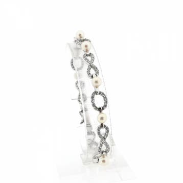 Witgouden infinityschakel armband met parel en zirconia |..., Gebruikt, Ophalen of Verzenden, Met edelsteen, Goud
