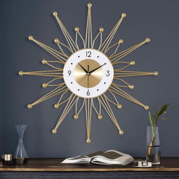 Design Klok Sunburst Goud | Tweedekansje | OP=OP, Ophalen of Verzenden, Nieuw, Analoog, Wandklok
