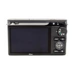Nikon 1 J2 Camera Body Zwart (Occasion) - 5660 Opnamen, Ophalen of Verzenden, Zo goed als nieuw, Nikon, Minder dan 4 keer