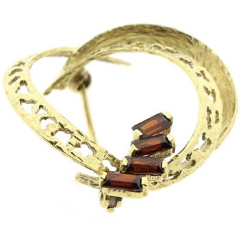 Vintage gouden ronde fantasie broche met rode stenen, Gebruikt, Ophalen of Verzenden, Met edelsteen, Goud