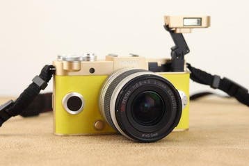Pentax Pentax Q-S1 + SMC 5–15mm f/2.8–4.5 lens Digitale, Nieuw