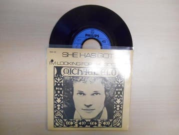 vinyl single 7 inch - Michael Elo - She Has Got... / Im..., Verzenden, Zo goed als nieuw, 7 inch, Pop