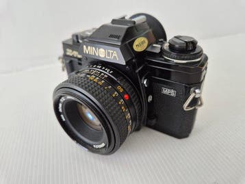 Minolta X-700 met f2/50mm lens en zoomlens e.d. Analoge, Nieuw