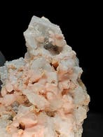 Rhodocrosiet na calciet fluorescerend met baryte Nieuwe