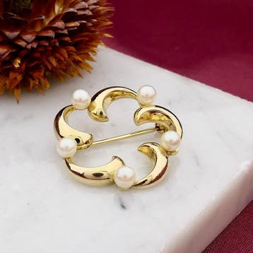 8 Karaat florale broche met parel, Gebruikt, Geel, Ophalen of Verzenden, Met edelsteen