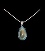 Hoge kwaliteit hemelobsidiaan met oog. Zilveren hanger 925.