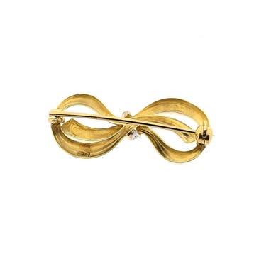 Bicolor gouden strik broche met diamant 0,02 ct; 14 karaat, Gebruikt, Ophalen of Verzenden, Met edelsteen, Goud