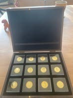 Nederland. Set van 24 vergulde gouden tientjes van het