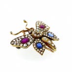 Gouden broche van een vlinder met diamant, robijn en saff..., Gebruikt, Overige kleuren, Ophalen of Verzenden, Met edelsteen