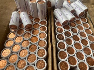 Oeganda. 1 shilling 1987 Lot 1 Kg coins in roll, UNC