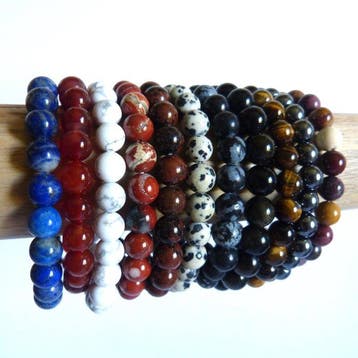 Prachtige collectie armbanden van lapis lazuli, tijgeroog,