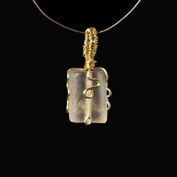 Oud-Romeins Pendant, met een draad omwikkelde Romeinse
