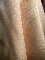 Geometrisch jacquard in parelmoer en oranje - tijdloze