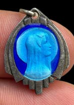 Profilo del Silenzio: Votieve medaille die de maagd afbeeldt