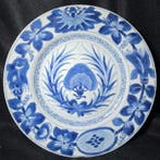 Schotel (27 cm) met decors van passievruchten. - Porselein -