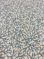 Elegant en delicaat stof met een motief van zeekoraal in