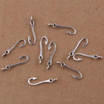 10x Tibetaans zilveren bedel van een vis haakje 20x1,5mm, Ophalen of Verzenden, Nieuw, Bedel