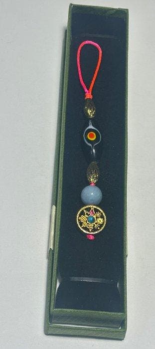 Aquamarijn met Dzi-amuletten Doble Ojo del Fénix en