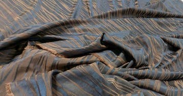 Jacquard moderno in seta e riflessi naturali – Castello del