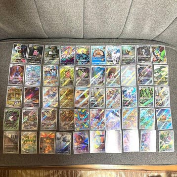 50 Bulk kaarten - Flygon, Metagross 50 Alternate art, Hobby en Vrije tijd, Verzamelkaartspellen | Pokémon, Nieuw