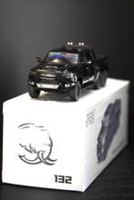 596 1:64 - Modelauto - RAM Hennessy Mammoth 6x6, Nieuw