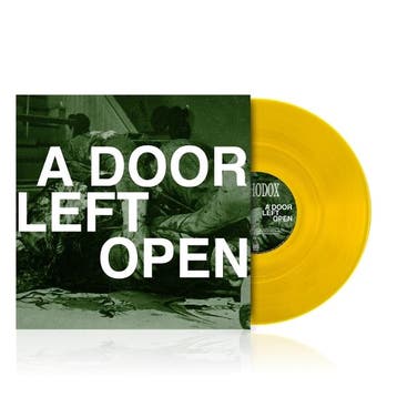 lp nieuw - orthodox - A DOOR LEFT OPEN (nieuw), Verzenden, Zo goed als nieuw, Overige formaten