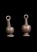 Oude Egypte, Nieuwe rijk Zilver Papaver Amulet Paar