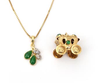 14 krt. gouden rijtuig en 18 krt. gouden collier met hanger, Gebruikt