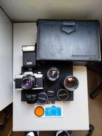 Minolta XG-M + MD 1,7/50mm + MC W.Rokkor 2,5/28mm + MC Tele, Nieuw