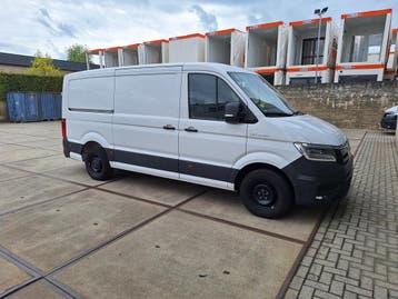 MAN TGE GB 2.0 TDI 177pk SW H1 3.180 FWD Aut 2024 Wit, Auto's, Dealer onderhouden, Gebruikt, MAN, Wit
