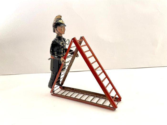 Günthermann - Blikken speelgoedfiguur - Mechanical Fireman, Antiek en Kunst, Antiek | Speelgoed