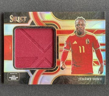 2025/26 Panini Select Jérémy Doku Memorabilia kaart - 1 Card, Verzamelen, Nieuw