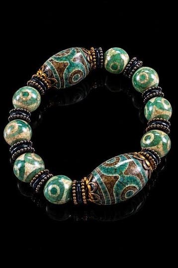 Exclusieve Tibetaanse armband met Dzi tijgertand - Ultieme