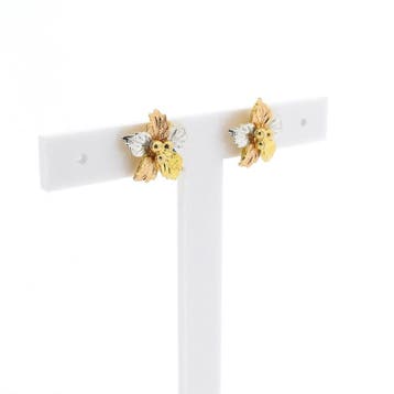 Tricolor gouden oorstekers als bloem (Oorbellen), Ophalen of Verzenden, Gebruikt, Goud, Goud