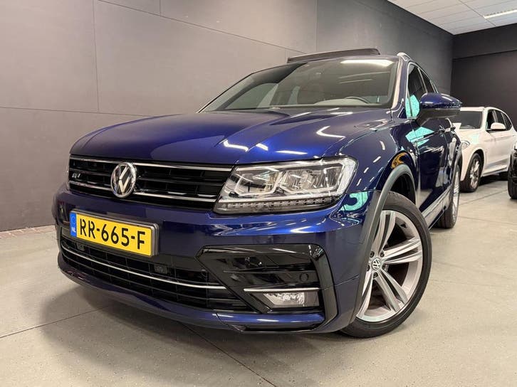 Zakelijke Lease |  Volkswagen Tiguan 1.4 TSI ACT R-LINE PANO, Auto's, Volkswagen, Dealer onderhouden, Lease, Grijs, Automaat, SUV of Terreinwagen