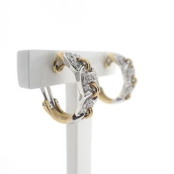 Bicolor oorbellen met diamant; 0,48 ct., Sieraden, Tassen en Uiterlijk, Oorbellen, Gebruikt, Overige kleuren, Ophalen of Verzenden