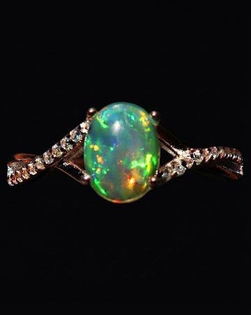 Opaal - Zilver, Le Miroir des Cieux – Ring Welo-opaal – Het