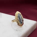 Gouden ring met hematiet, Sieraden, Tassen en Uiterlijk, Ringen, Gebruikt, Overige kleuren, Ophalen of Verzenden, 17 tot 18