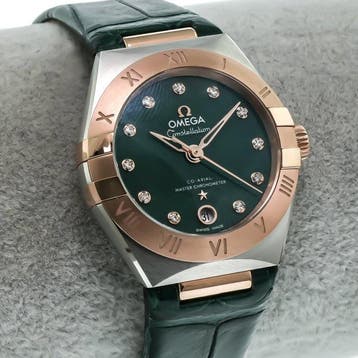 OMEGA – 29 mm, Stainless steel – Sedna gold on leather strap, Nieuw