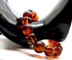 Armband met Baltische barnsteen kralen in cognakkleur. -, Nieuw