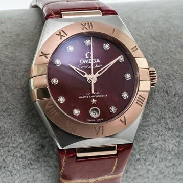 OMEGA – 29 mm, Stainless steel – Sedna gold on leather strap, Nieuw