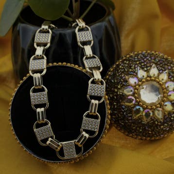 Gouden schakelarmband met zirconia; 22 cm, Sieraden, Tassen en Uiterlijk, Armbanden, Gebruikt, Ophalen of Verzenden, Met edelsteen