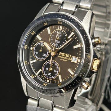 Seiko - Chronograph - Quartz - Black/Gold Dial - Zonder