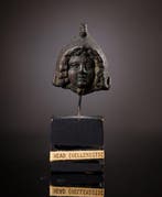 Oud-Griekenland, applique, karakterhoofd met Phrygische muts