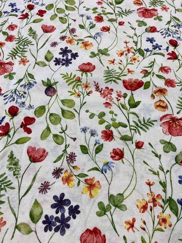 Elegante en delicate stof met veldbloemenmotief in dubbele