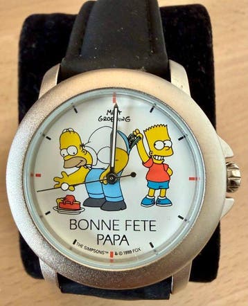 The Simpsons, “Bonne Fête Papa” (1999) – cassa 34,5 mm - 1, Nieuw in verpakking