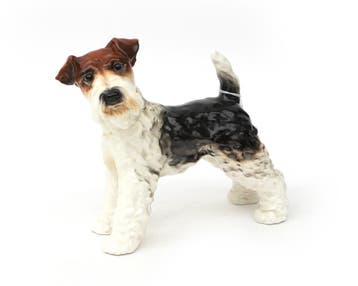 Een porseleinen beeld van een hond, vervaardigd door Goebel, Antiek en Kunst
