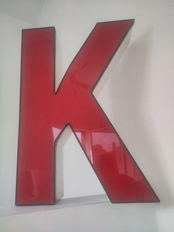 Figuur - K voormalige verlichte letter in geweldige