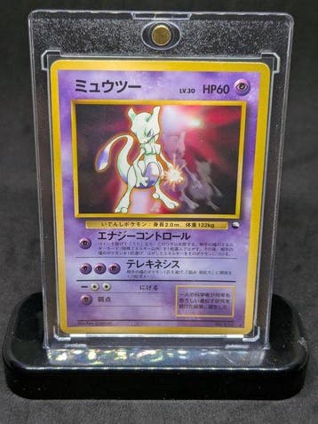 Pokémon - 1 Card - 1997/Mewtwo associated with the World, Hobby en Vrije tijd, Nieuw