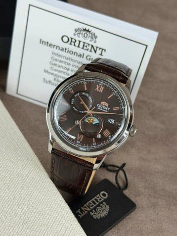 Orient - Bambino Sun & Moon Day/date Automatic Brown -, Nieuw